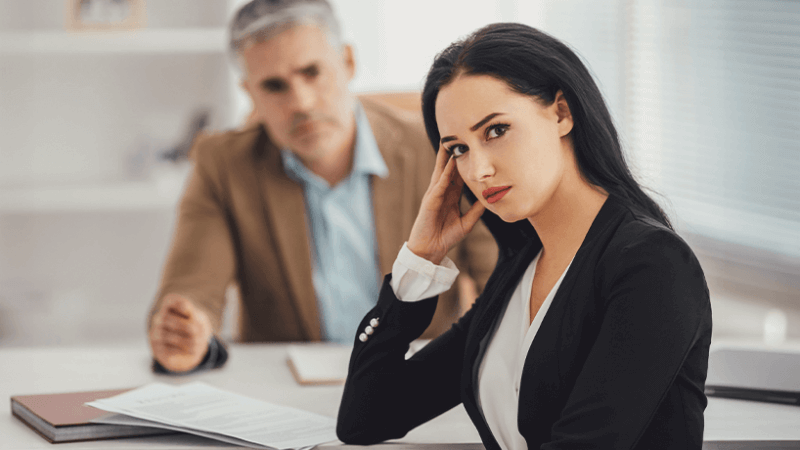 Woman looking annoyed while in a job interview